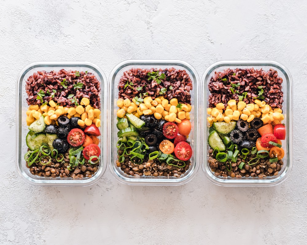 Nutritionist reviewing scientific research for meal planning articles